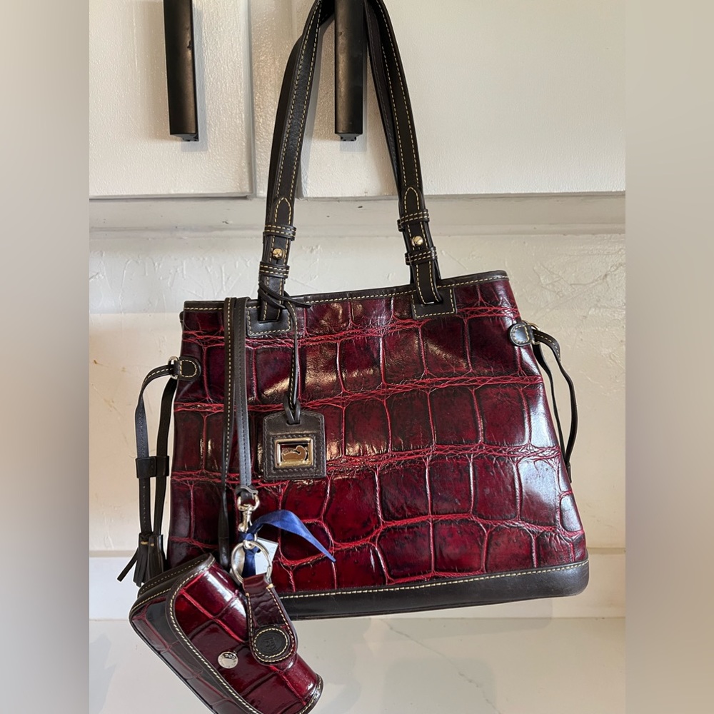 Dooney & Bourke - color Bordeaux- Double Strap Tassel Bag -New